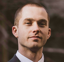 Portrait of Thomas Whitfield, trading analyst and crypto market expert